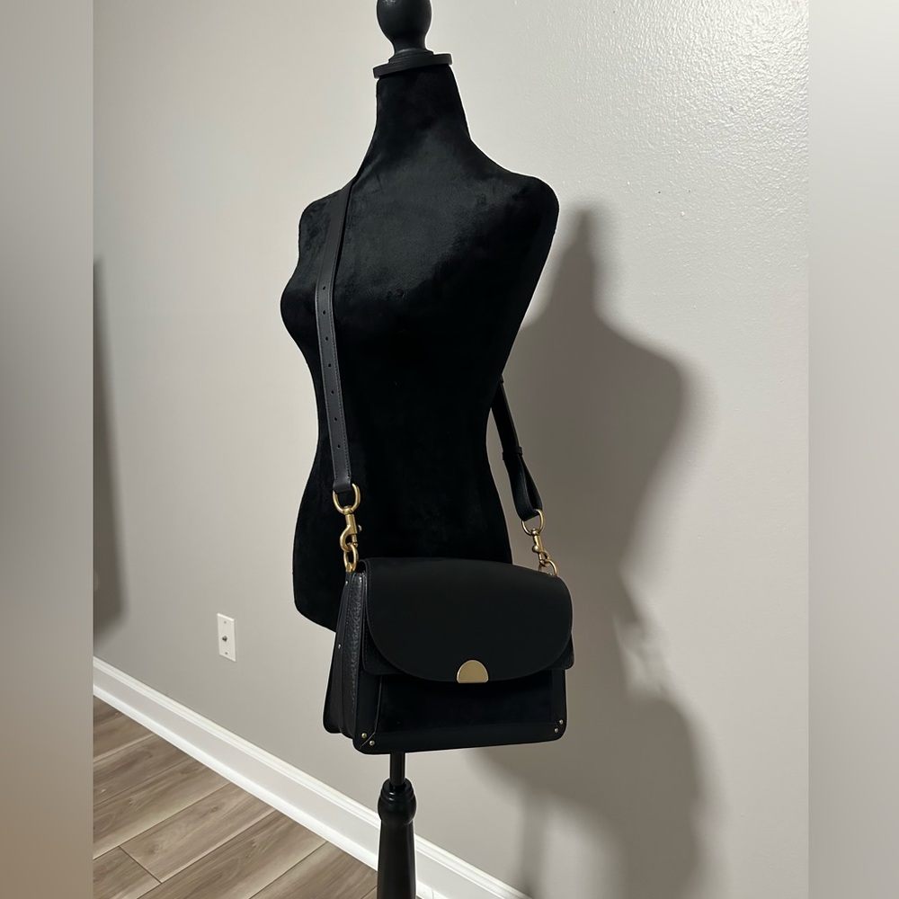 Medium size coach dressy bag.